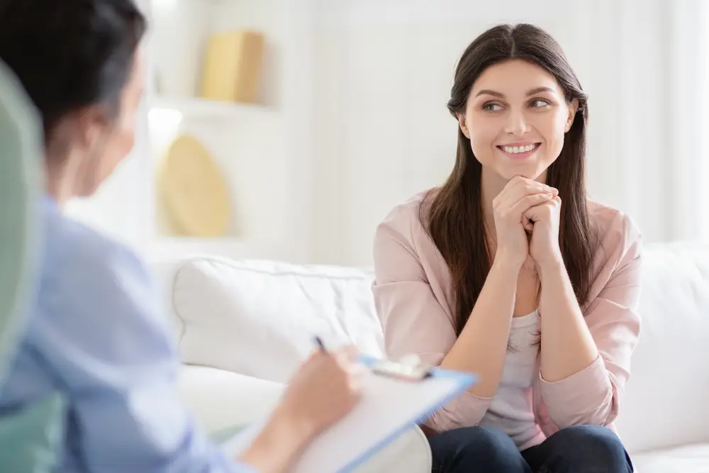 Smiling women talking to wellness coach